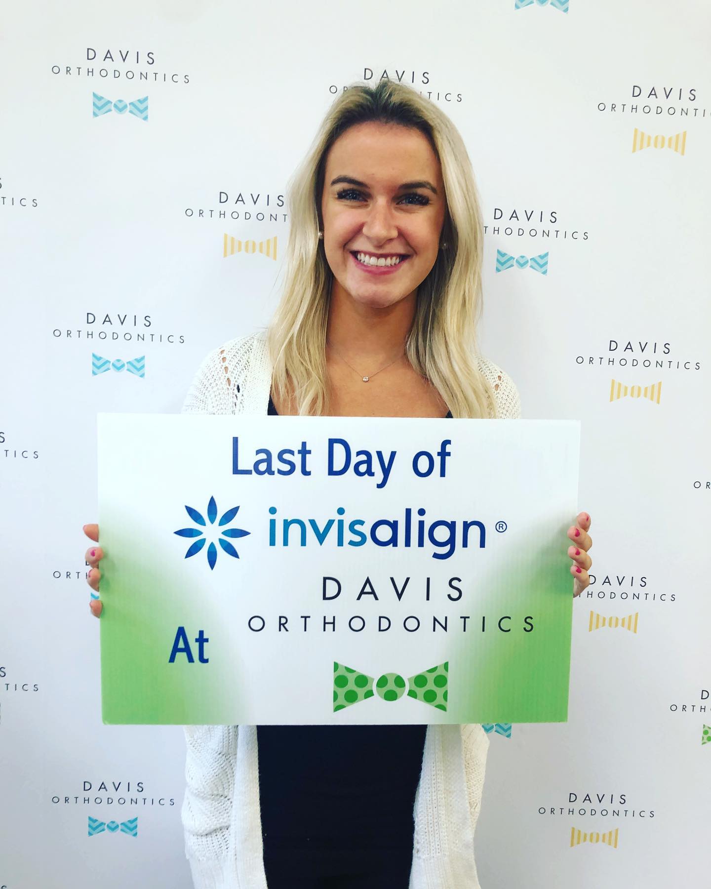 a-lady-on-her-last-day-of-invisalign-treatment